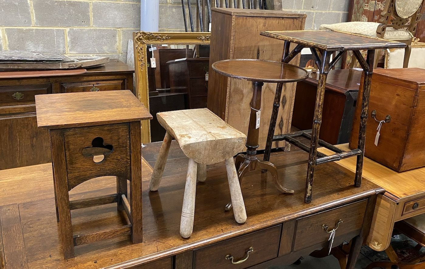 A late Victorian lacquered bamboo square occasional table, height 66cm, a provincial stool, Liberty style oak table and a wine table